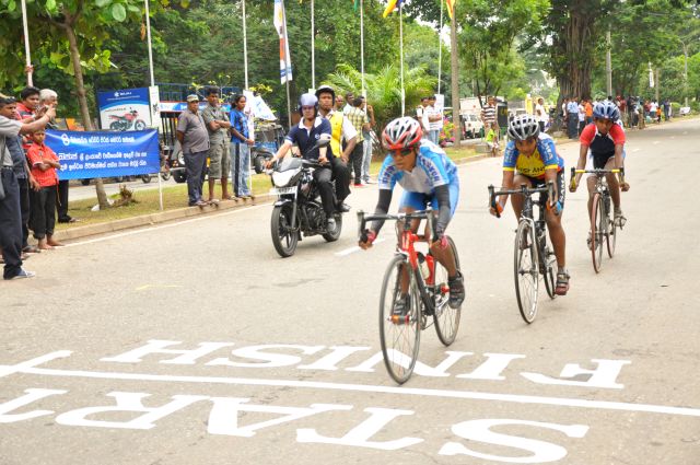 Airman Jeewan Jayasinghe peddles his way to the top at the Maurice Coomerawel Cycle Race