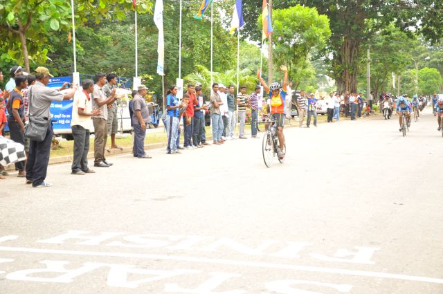 Airman Jeewan Jayasinghe peddles his way to the top at the Maurice Coomerawel Cycle Race
