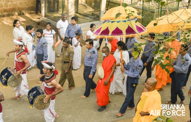 SLAF INVOKES THE BLESSINGS OF THE TRIPLE GEM WITH THE TRADITIONAL FLAG BLESSING AT THE SACRED
