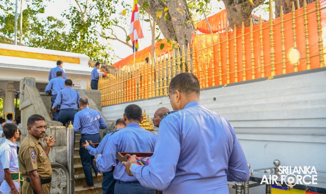 SLAF INVOKES THE BLESSINGS OF THE TRIPLE GEM WITH THE TRADITIONAL FLAG BLESSING AT THE SACRED