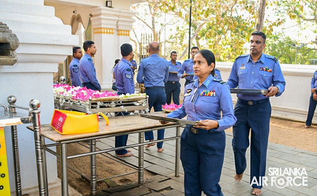 SLAF INVOKES THE BLESSINGS OF THE TRIPLE GEM WITH THE TRADITIONAL FLAG BLESSING AT THE SACRED