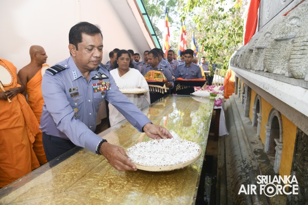 SLAF INVOKES THE BLESSINGS OF THE TRIPLE GEM WITH THE TRADITIONAL FLAG BLESSING AT THE SACRED