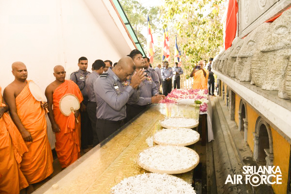 SLAF INVOKES THE BLESSINGS OF THE TRIPLE GEM WITH THE TRADITIONAL FLAG BLESSING AT THE SACRED
