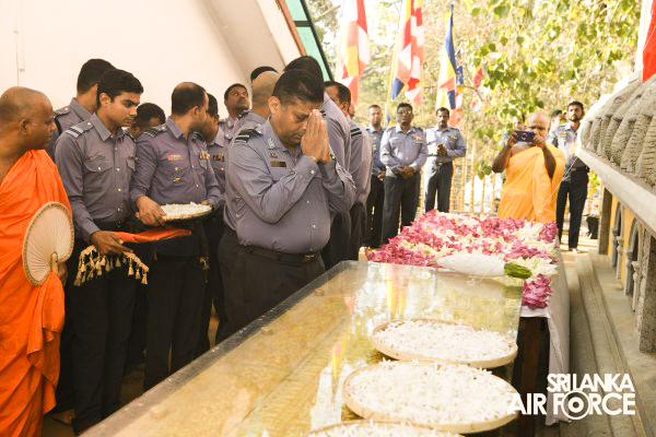 SLAF INVOKES THE BLESSINGS OF THE TRIPLE GEM WITH THE TRADITIONAL FLAG BLESSING AT THE SACRED
