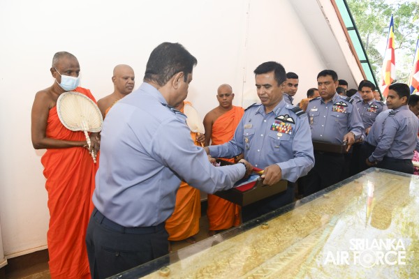 SLAF INVOKES THE BLESSINGS OF THE TRIPLE GEM WITH THE TRADITIONAL FLAG BLESSING AT THE SACRED