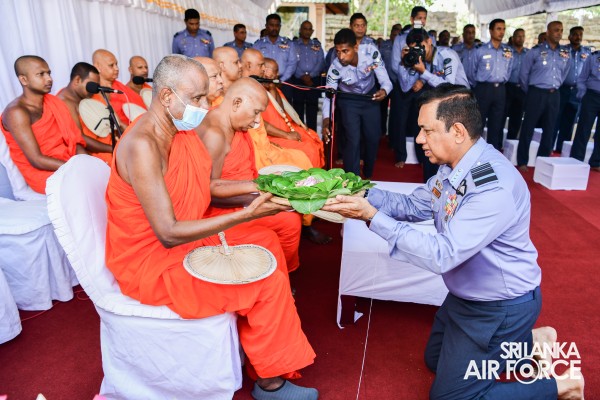 SLAF INVOKES THE BLESSINGS OF THE TRIPLE GEM WITH THE TRADITIONAL FLAG BLESSING AT THE SACRED
