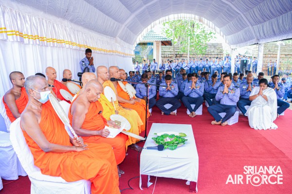 SLAF INVOKES THE BLESSINGS OF THE TRIPLE GEM WITH THE TRADITIONAL FLAG BLESSING AT THE SACRED