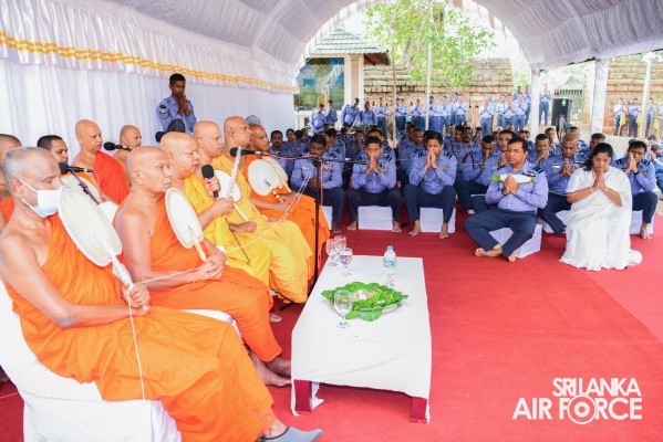 SLAF INVOKES THE BLESSINGS OF THE TRIPLE GEM WITH THE TRADITIONAL FLAG BLESSING AT THE SACRED