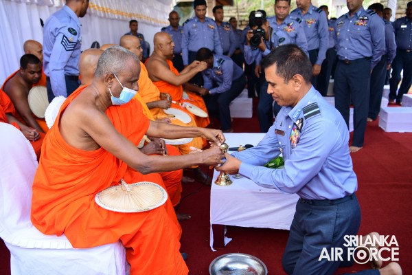 SLAF INVOKES THE BLESSINGS OF THE TRIPLE GEM WITH THE TRADITIONAL FLAG BLESSING AT THE SACRED