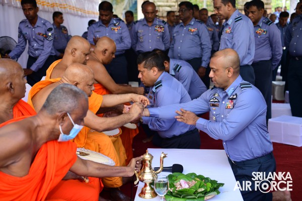 SLAF INVOKES THE BLESSINGS OF THE TRIPLE GEM WITH THE TRADITIONAL FLAG BLESSING AT THE SACRED