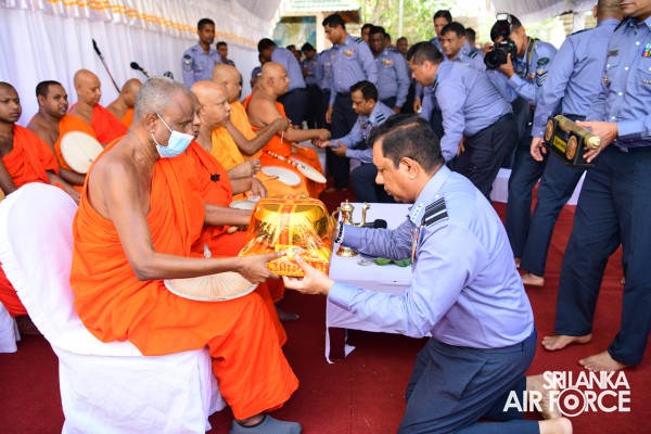 SLAF INVOKES THE BLESSINGS OF THE TRIPLE GEM WITH THE TRADITIONAL FLAG BLESSING AT THE SACRED