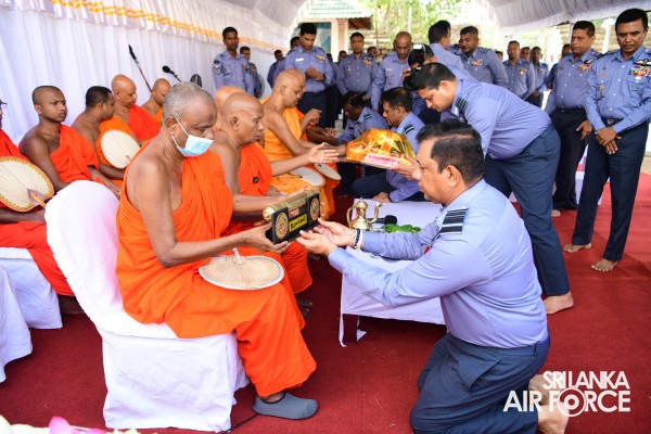 SLAF INVOKES THE BLESSINGS OF THE TRIPLE GEM WITH THE TRADITIONAL FLAG BLESSING AT THE SACRED