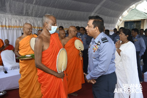 SLAF INVOKES THE BLESSINGS OF THE TRIPLE GEM WITH THE TRADITIONAL FLAG BLESSING AT THE SACRED