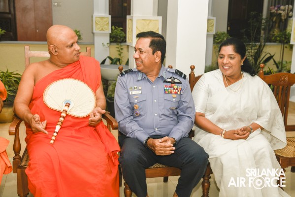 SLAF INVOKES THE BLESSINGS OF THE TRIPLE GEM WITH THE TRADITIONAL FLAG BLESSING AT THE SACRED