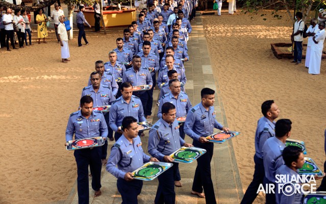 SLAF INVOKES THE BLESSINGS OF THE TRIPLE GEM WITH THE TRADITIONAL FLAG BLESSING AT THE SACRED