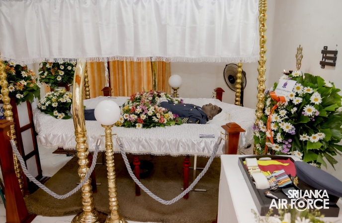 AIR CHIEF
PAYS LAST RESPECTS TO FALLEN SERVICEMEN