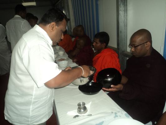 Pirith Chanting and Alms Giving at Palavi