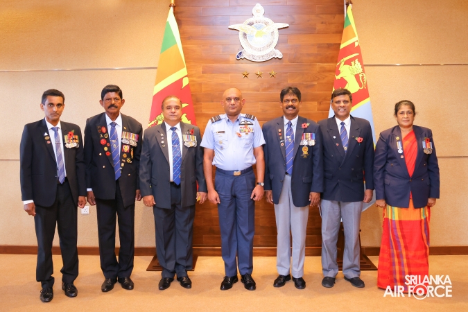 POPPY FLOWER PINNED ON COMMANDER OF THE SRI LANKA AIR FORCE IN COMMEMORATION OF REMEMBRANCE DAY