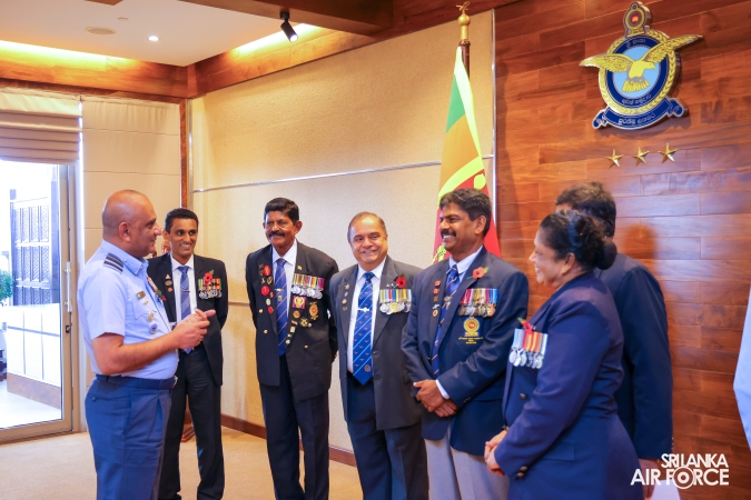 POPPY FLOWER PINNED ON COMMANDER OF THE SRI LANKA AIR FORCE IN COMMEMORATION OF REMEMBRANCE DAY