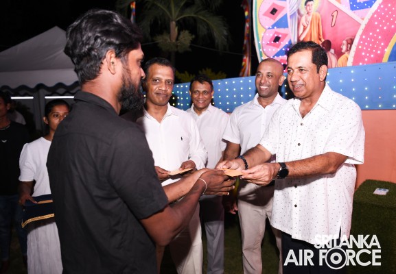 SLAF CELEBRATES POSON WITH VIBRANT PANDAL DISPLAY AND ACTS OF GENEROSITY