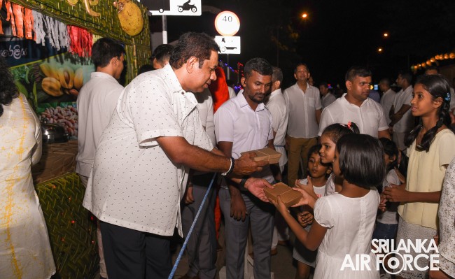 SLAF CELEBRATES POSON WITH VIBRANT PANDAL DISPLAY AND ACTS OF GENEROSITY