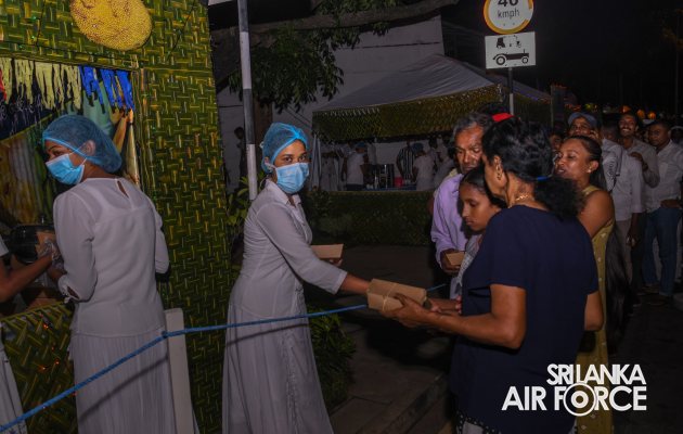 SLAF CELEBRATES POSON WITH VIBRANT PANDAL DISPLAY AND ACTS OF GENEROSITY