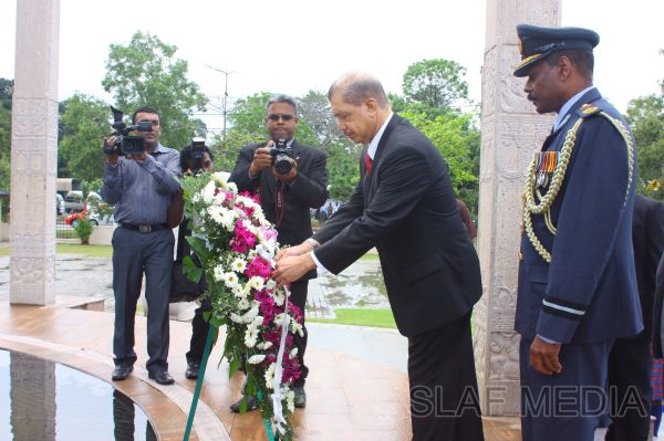 The
President of Seychelles pays a floral tribute to the fallen war heroes