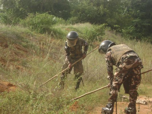 SLAF Recovers a Hidden Stock of Munitions and a Weapon