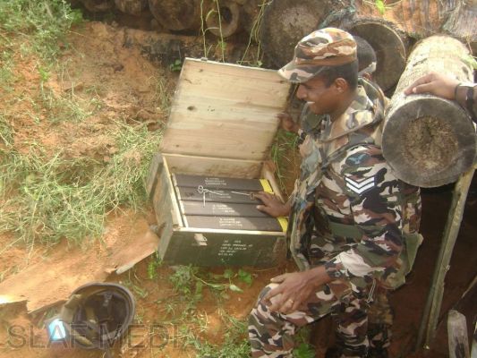 SLAF Recovers a Hidden Stock of Munitions and a Weapon